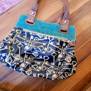 Varnished canvas fossil bag